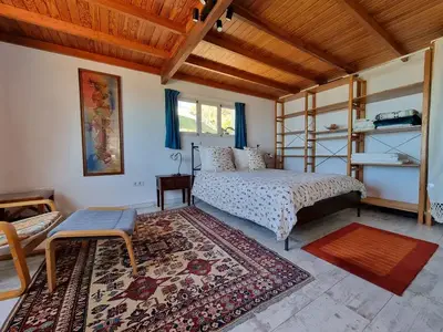 Bedroom with wooden ceilings