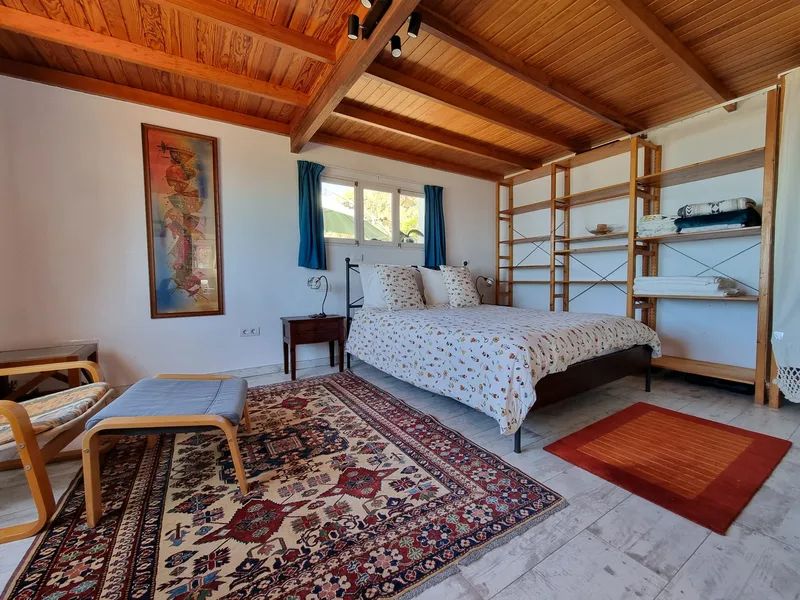 Bedroom with wooden ceilings