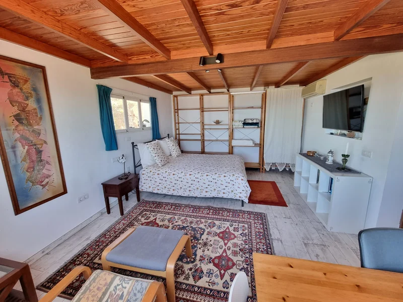Bedroom with wooden ceilings