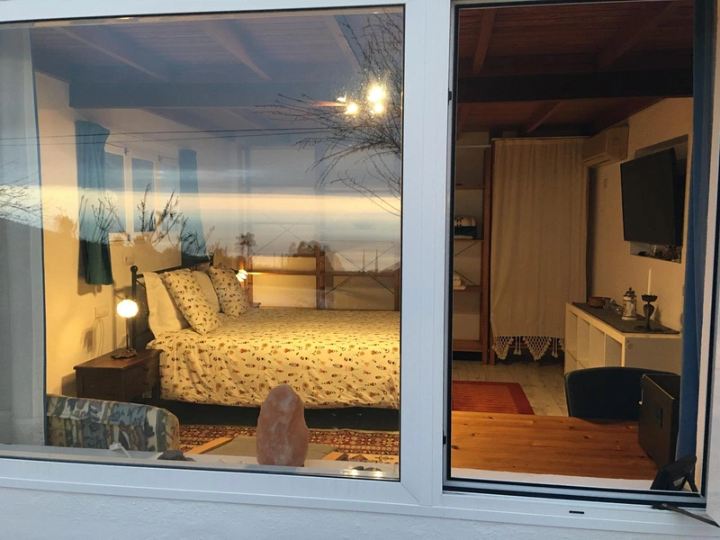Bedroom with wooden ceilings