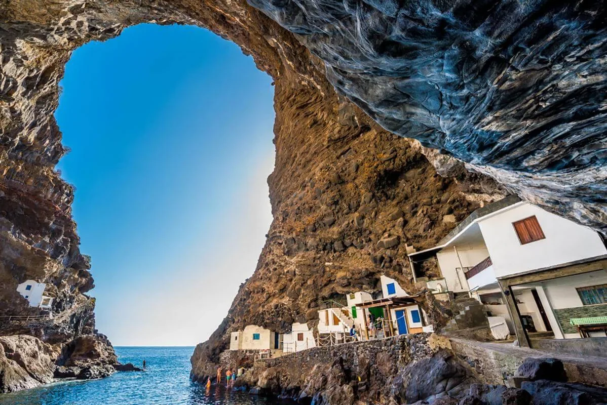Houses beneath the coastal cave at Porís de Candelaria, Tijarafe